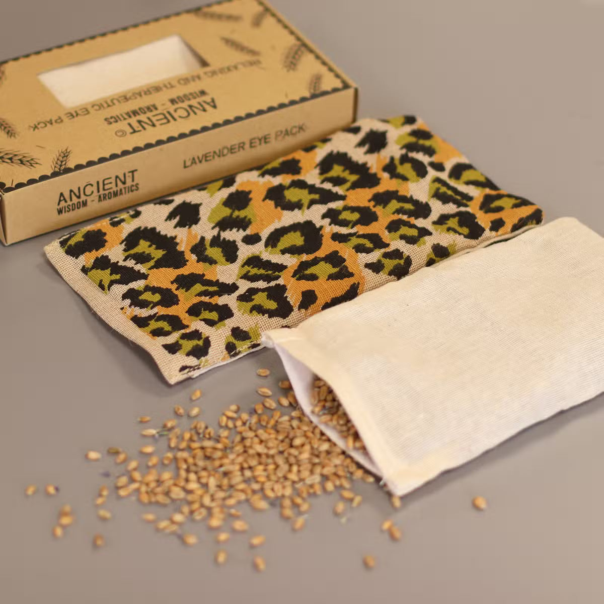 Lavendelögonkudde i presentask med nattleopardmotiv