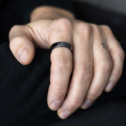 Hematitring på en hand