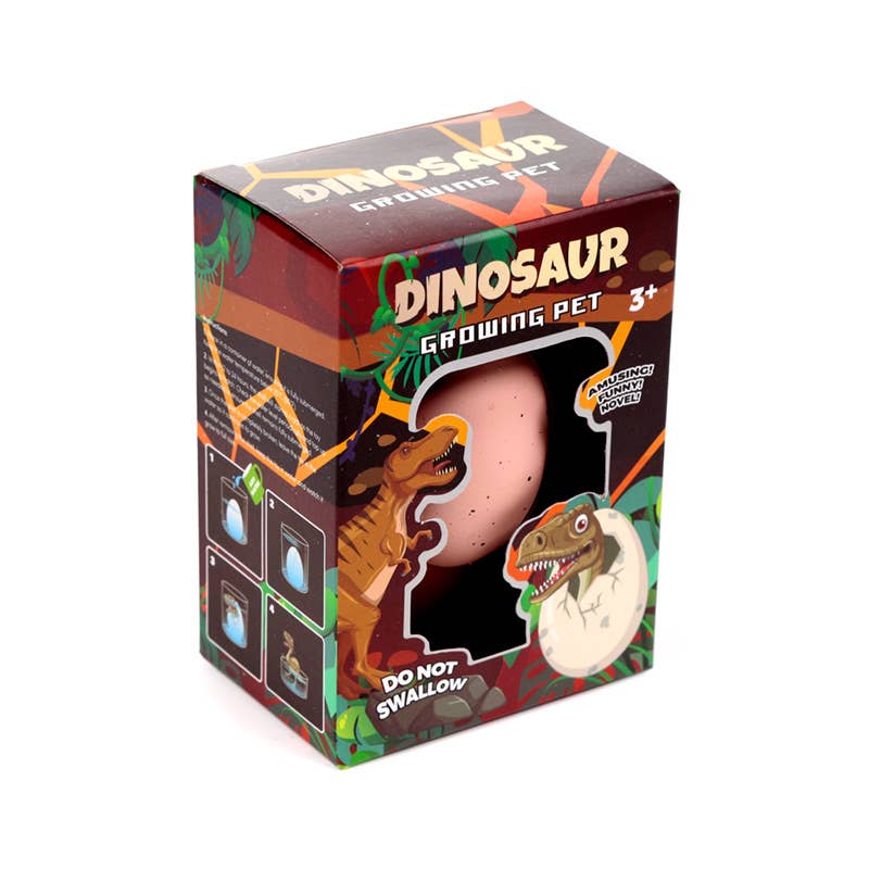 Kläckande ägg med dinosaurie