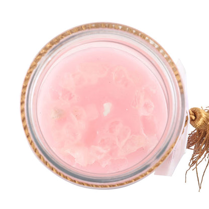 Kristalljus med rosa vax och stenar, sett uppifrån
